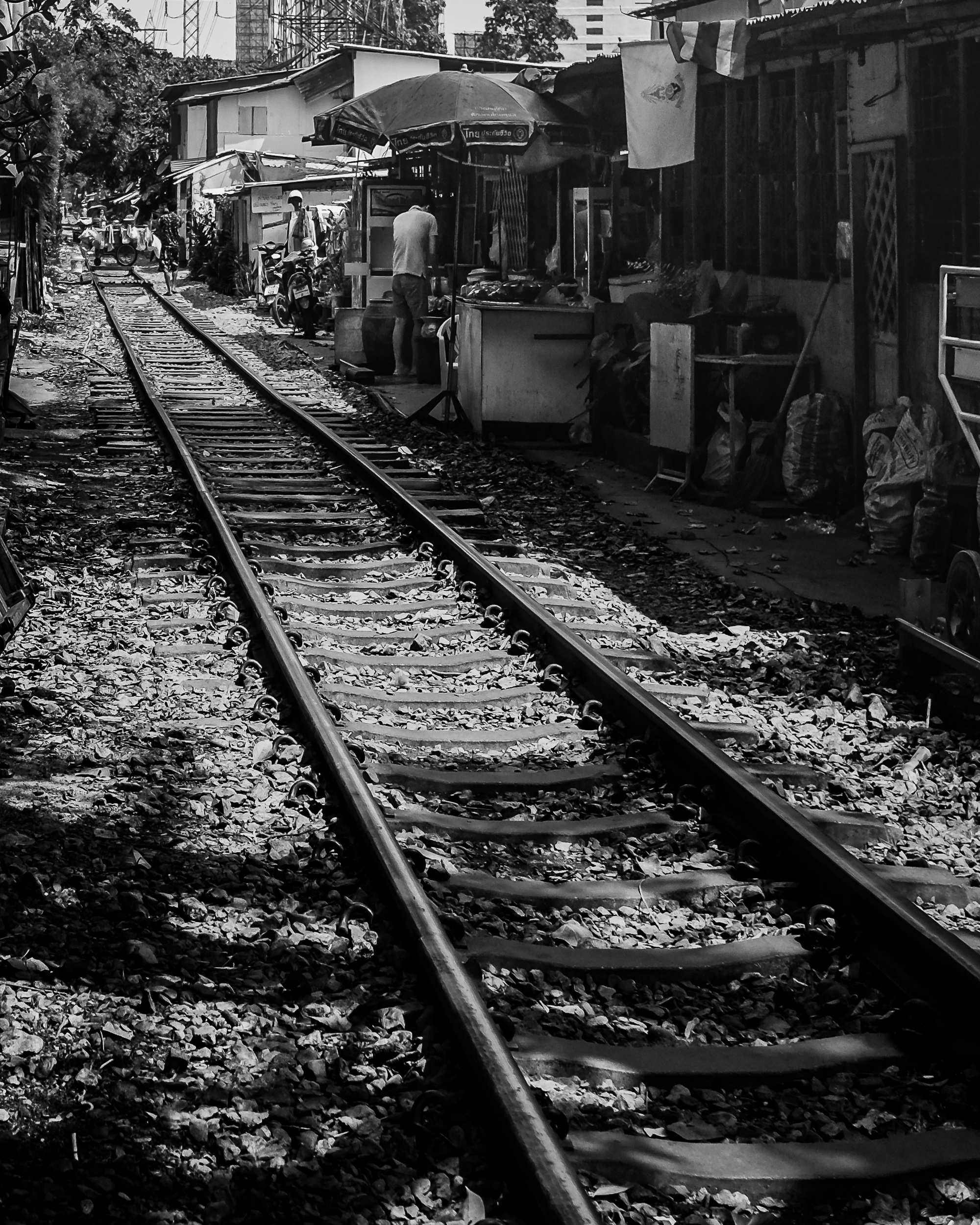 Railway tracks passing through a tightly built neighbourhood